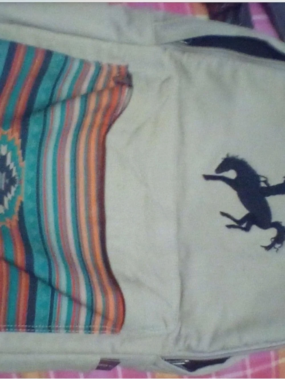 Cream colored Rowdy Crowd backpack NWT has Turquoise Patterned Front Pocket